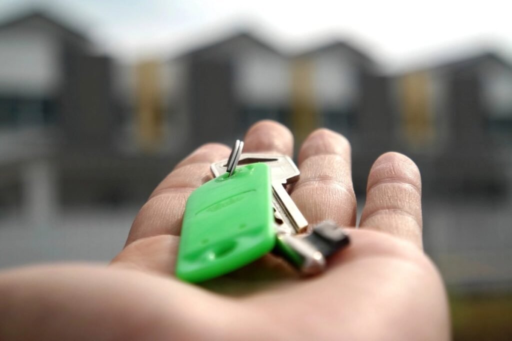 New homeowner holding house keys